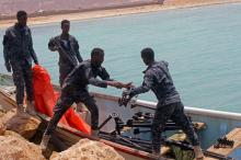 Somali Puntland forces receive weapons seized in a boat on the shores of the Gulf of Aden in the city of Bosasso, Puntland region, Somalia, September 23, 2017. PHOTO BY REUTERS/Abdiqani Hassan