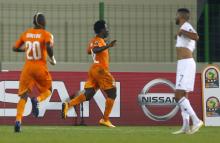 Ivory Coast's Wilfried Bony (R) celebrates his second goal during their quarter-final soccer match of the 2015 African Cup of Nations against Algeria in Malabo, February 1, 2015. PHOTO BY REUTERS/Amr Abdallah Dalsh