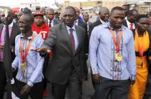 Kenya's Deputy President William Ruto (C) welcomes the national athletics team at the Jomo Kenyatta airport in Nairobi, September 1, 2015, after they topped the medals table at the recently concluded 15th International Association of Athletics Federations (IAAF) World Championships at the National Stadium in Beijing, China. PHOTO BY REUTERS/Thomas Mukoya