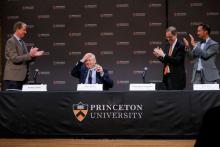 Canadian-American scientist James Peebles (C) is greeted as he speaks to attendees after he won the 2019 Nobel Prize for Physics along with Michel Mayor and Didier Queloz, at Princeton University, New Jersey, U.S., October 8, 2019. PHOTO BY REUTERS/Eduardo Munoz