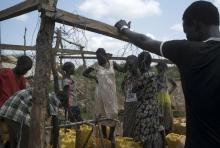 South Sudanese women collect water in the United Nations protection of civilians site hosting about 30,000 people displaced during the recent fighting in Juba, South Sudan, July 22, 2016. PHOTO BY REUTERS/Adriane Ohanesian