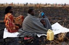Women wait to be registered prior to a food distribution carried out by the United Nations World Food Programme (WFP) in Thonyor, Leer state, South Sudan, February 25, 2017. PHOTO BY REUTERS/Siegfried Modola
