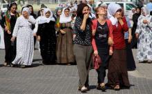 Women mourn during a funeral ceremony for three Turkish Kurdish men, who were killed during clashes between security forces and PKK on Friday, in the southeastern town of Silopi in Sirnak province, Turkey, August 8, 2015. PHOTO BY REUTERS/Sertac Kayar