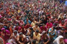Garment workers listen to speakers during a rally demanding an increase to their minimum wage in Dhaka, September 21, 2013. PHOTO BY REUTERS/Andrew Biraj