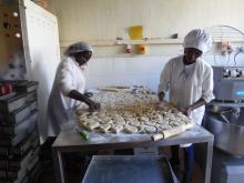 Workers produce sweet potato products at a processing factory in Maua, Meru County, Kenya, January 26, 2020. PHOTO BY Thomson Reuters Foundation/Caroline Wambui