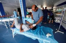A wounded fighter from Libyan forces allied with the U.N.-backed government, who was injured during a battle with Islamic State militants in Sirte, receives treatment in the field hospital in Sirte, Libya, September 22, 2016. PHOTO BY REUTERS/Ismail Zitouny
