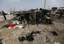 The wreckage of a British embassy vehicle after a suicide attack in Kabul, November 27, 2014. PHOTO BY REUTERS/Omar Sobhani