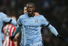 Manchester City's Yaya Toure celebrates after scoring the opening goal during their English Premier League soccer match against Sunderland at the Etihad Stadium in Manchester, northern England, January 1, 2015. PHOTO BY REUTERS/Andrew Yates