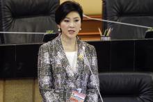Ousted former Prime Minister Yingluck Shinawatra delivers her statement at the National Legislative Assembly meeting in Bangkok, January 22, 2015. PHOTO BY REUTERS/Chaiwat Subprasom