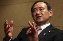 Japan's Chief Cabinet Secretary Yoshihide Suga speaks during an interview with Reuters in Tokyo, February 15, 2014. PHOTO BY REUTERS/Yuya Shino