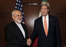 U.S. Secretary of State John Kerry (R) meets with Iran's Foreign Minister Mohammad Javad Zarif at the United Nations Headquarters in New York City, U.S., April 19, 2016. PHOTO BY REUTERS/Brendan McDermid