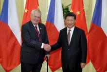 Chinese President Xi Jinping (R) shakes hands with Czech President Milos Zeman at the Great Hall of the People in Beijing, China, September 4, 2015. PHOTO BY REUTERS/Lintao Zhang