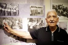 Zevulun Hareli, 90, who immigrated from Iraq to Israel in 1949, points at photos on display at the Babylonian Jewry Heritage Center in Or Yehuda, Israel, April 16, 2018. PHOTO BY REUTERS/Amir Cohen