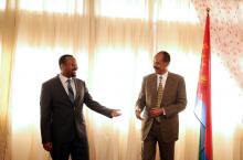 Eritrea's President, Isaias Afwerki, talks to Ethiopia's Prime Minister, Abiy Ahmed during the Inauguration ceremony marking the reopening of the Eritrean Embassy in Addis Ababa, Ethiopia July 16, 2018. REUTERS/Tiksa Negeri