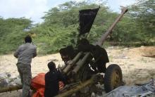 Members of the hard line al Shabaab Islamist rebel group prepare artillery gunfire near their Haliwa district base in Somalia's capital Mogadishu, July 21, 2010. PHOTO BY REUTERS/Feisal Omar