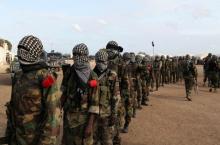 Members of al Shabaab parade at Ala Yaasir camp, outside of Somalia's capital Mogadishu, September 3, 2011. PHOTO BY REUTERS/Feisal Omar