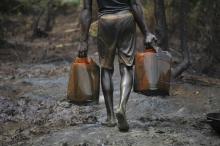 A man works at an illegal oil refinery site near river Nun in Nigeria's oil state of Bayelsa. PHOTO BY REUTERS/Akintunde Akinleye